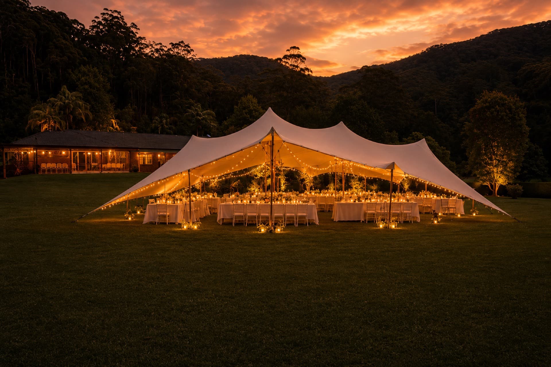 Wedding marquee on the lawn at sunset