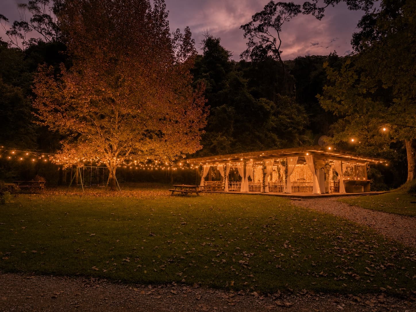 Pergola lit with festoon lights at twilight
